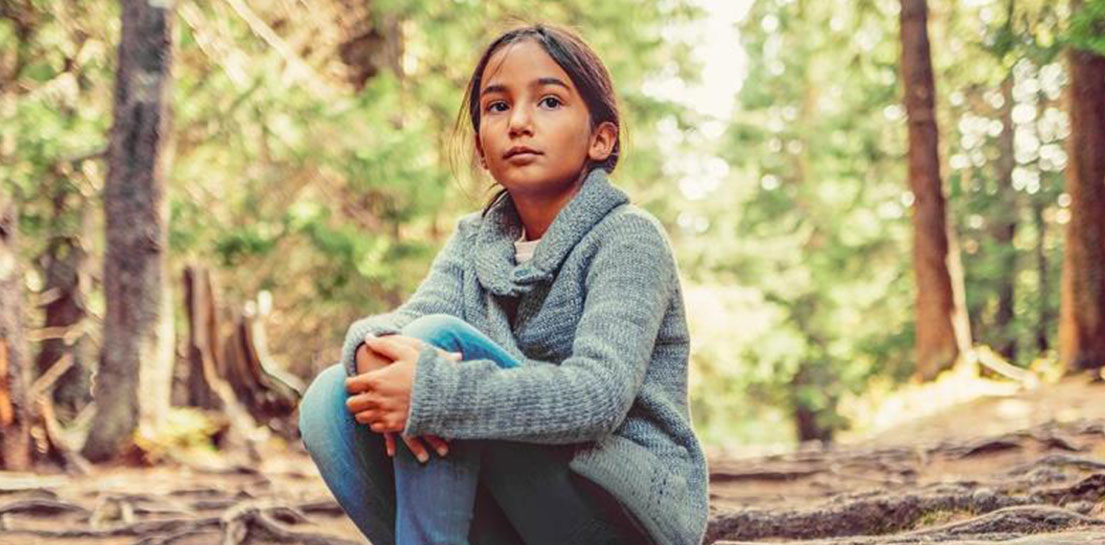 Child sitting alone